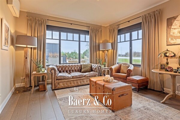 photo 11 Uitzonderlijke Duplex met zicht op kanaal, garage, carport en ruime (wijn)kelder!