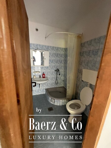 photo 13 House with a Plot in a Premium Location for Renovation